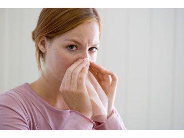 Dry Nose Of Woman blowing nose